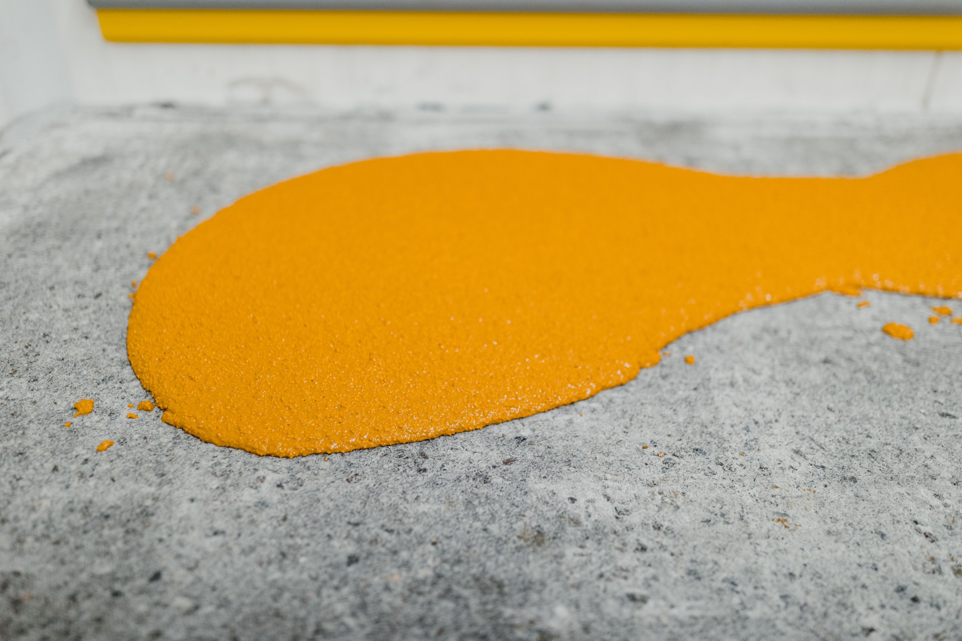 Close details of the floor layer covered with resin and epoxy paint